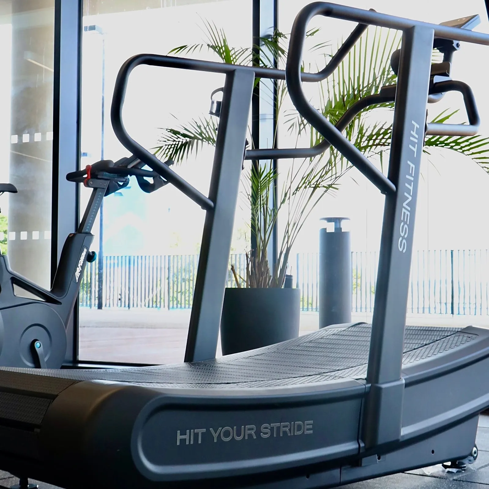 Hit Fitness Air Runner Curved Treadmill, TENS unit muscle stimulator, Hyrox, Peloton Bike 