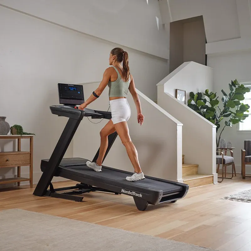 NordicTrack LE Treadmill, Weightlifting chalk, Reflective running vest, Gym lock combination
