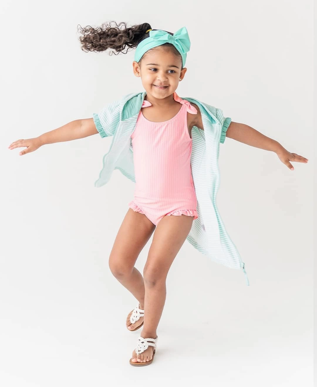 RuffleButts Girls UPF50  Sun Protection Tie Shoulder/Cross Back One Piece Swimsuit