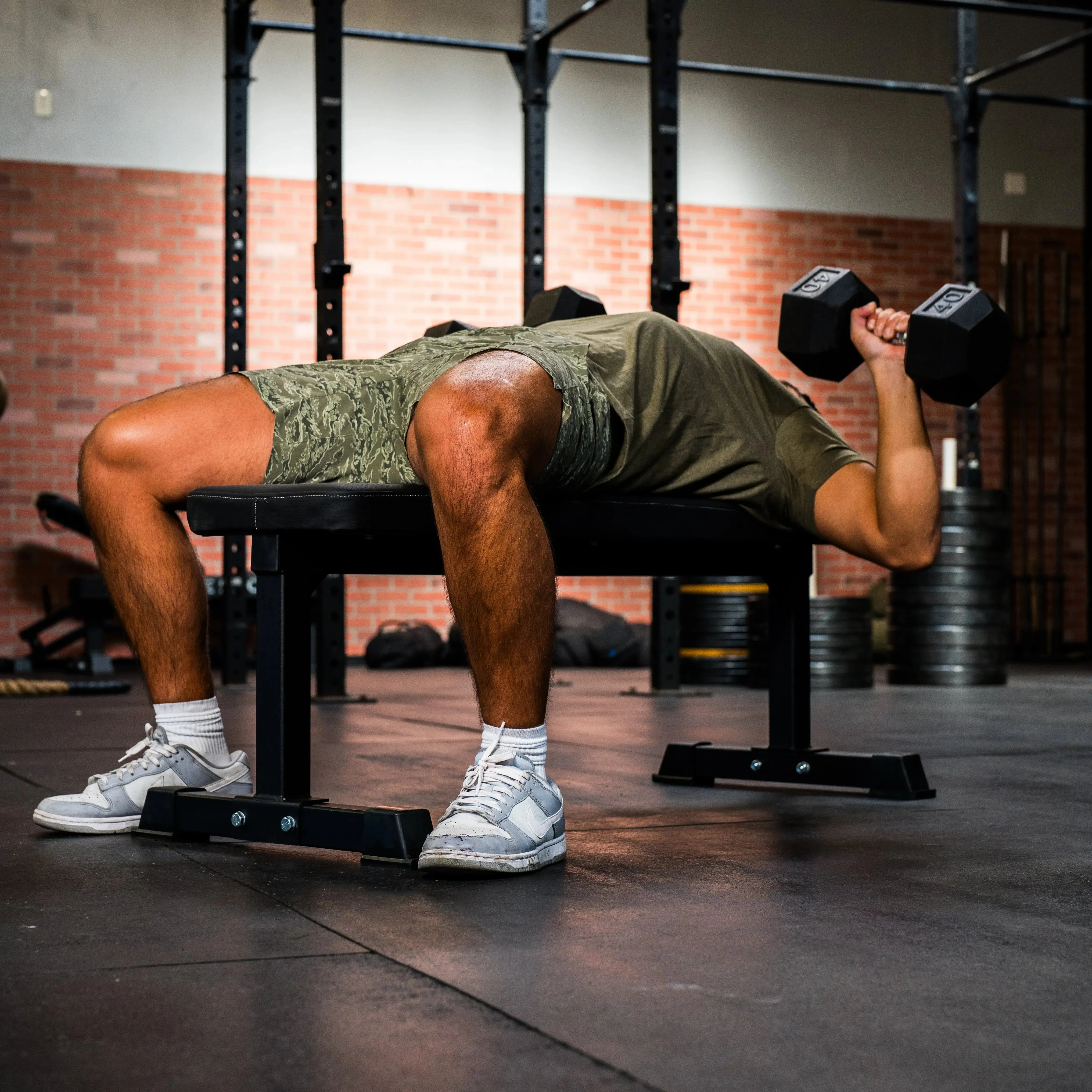 Flat Bench, Bumper Plates, Overhead pulley storage