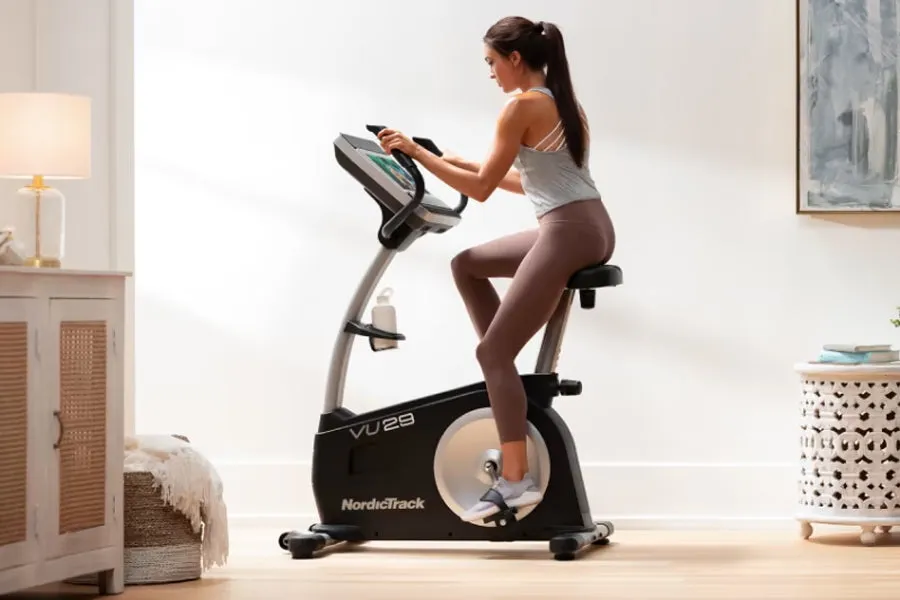 NordicTrack Commercial VU 29 Upright Exercise Bike (IN-STORE SPECIAL), Yoga Bolster, Sleds