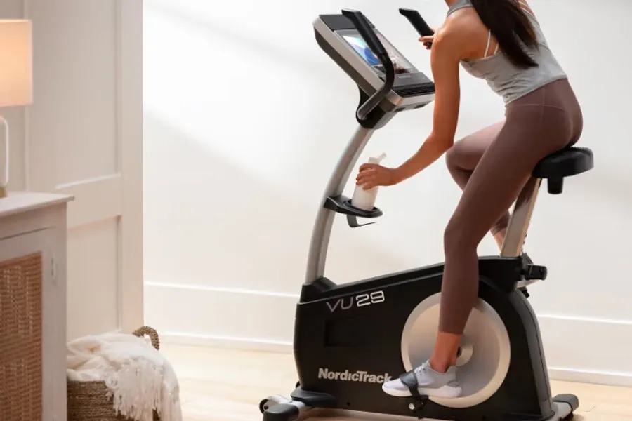 NordicTrack Commercial VU 29 Upright Exercise Bike (IN-STORE SPECIAL), Pilates reformer machine, Rollable Sled Track, Calisthenics